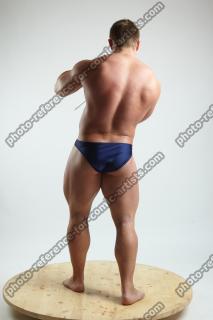 ADAM_WARD STANDING WITH TWO DAGGERS